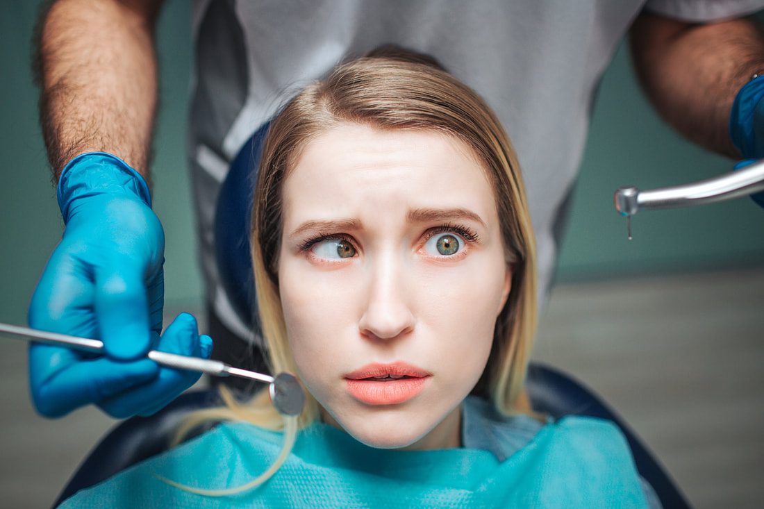 Confused Woman at Dentist