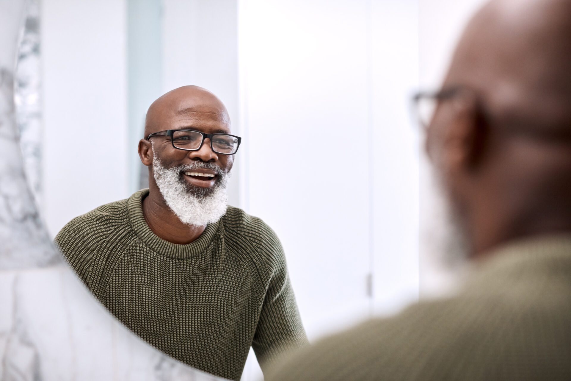 Man Smiling in the Mirror