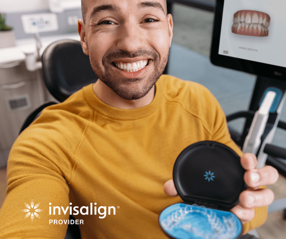 Man Holding His Invisalign